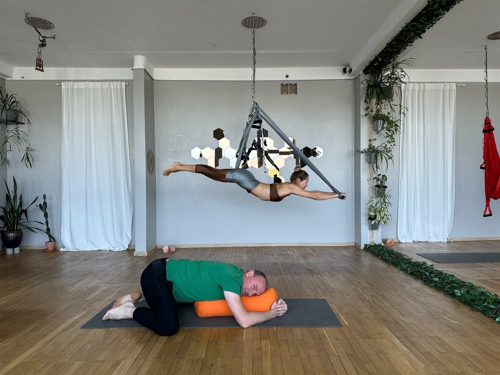 Aerial yoga practice at a Vilnius studio
